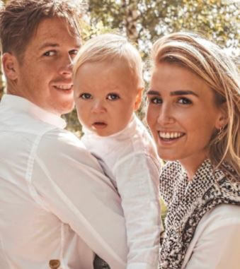 Tim Koeman with his wife Chloe and their son Xavi.